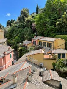 a view of roofs of houses in a village at Mansarda Portofino in Portofino