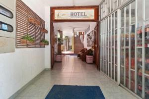 a hallway of a hotel with a sign that reads hotel at Oleajes Capurganá in Capurganá