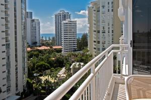 a balcony with a view of a city with tall buildings at Ocean Sands Resort in Gold Coast
