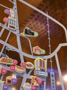 a board game with a train on a street at CHECK inn HIVE in Luodong +145 photos