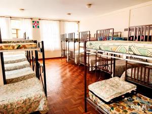 a room filled with lots of bunk beds at Casa Betania in La Paz