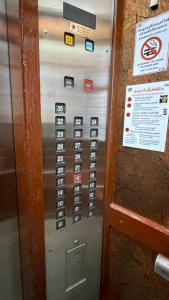 a machine with a bunch of signs on it at omni1818 in Bang Kapi