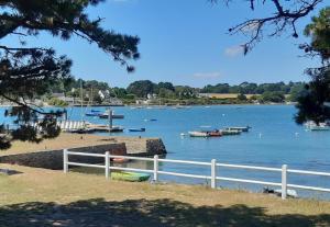 a view of a body of water with boats in it at Chambres d'hôtes de botconan in Baden