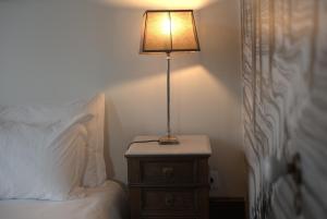 Uma cama ou camas num quarto em Casa com Historia