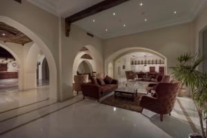 A seating area at Mazar Resort & Spa By Kemet
