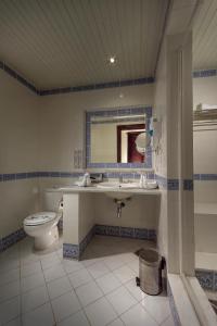 A bathroom at Mazar Resort & Spa By Kemet