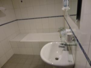 Koupelna v ubytování Yi Pin Yuan Hotel