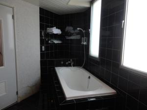 Koupelna v ubytování Yi Pin Yuan Hotel