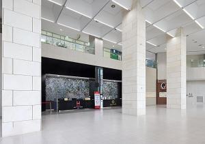 a large lobby with white columns in a building at Incheon Songdo Stay31 in Incheon +85 photos