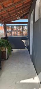 an empty room with a sink and a window at Moraes Residence in Belo Horizonte