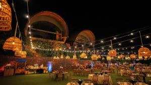 a banquet hall with tables and chairs and lights at Andaz Peninsula Papagayo Resort, Costa Rica, by Hyatt in Culebra +84 photos