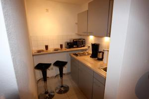 Kuchyň nebo kuchyňský kout v ubytování Apartment BELLA Studio - EP Ticket Garantie