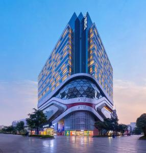 a rendering of a tall building at Dorsett Wuhan in Wuhan