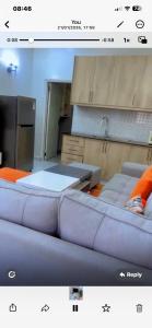 a picture of a kitchen with two couches at Kiminini bnb in Kitale