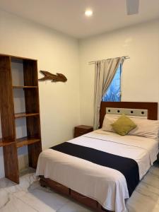 a bedroom with a large bed and a window at Cocos House Zicatela in Puerto Escondido +47 photos