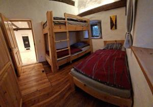 a bedroom with two bunk beds in a house at Ferienhaus Wittmann in Beilngries