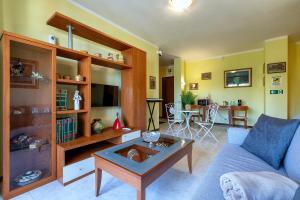 a living room with a couch and a table at Cuncordu Affittacamere- Sassari in Sassari