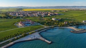 an aerial view of a resort on a lake at SoleMare Luxury 2 Bedroom Apartment in Aheloy