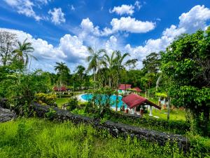 a view of a resort with a swimming pool at Graceland Resort Tayabas Quezon in Tayabas