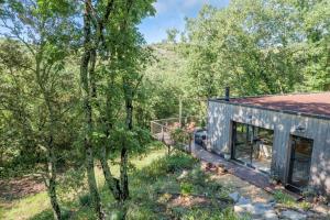 a house in the middle of the woods at Casa Frida in Salavas