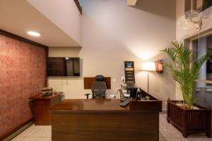 an office with a desk and a chair in a room at Revathi Resorts in Jajal