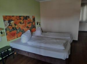 Lova arba lovos apgyvendinimo įstaigoje Hotel Maxsoyi