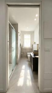a bathroom with a toilet and a sink and a mirror at Casa LIAM & Casa ISABEL in Chioggia +24 photos