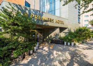 a building with a sign for a flowers hotel at Wolmido Premiers Hotel in Incheon
