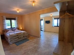 a bedroom with a bed and a television in it at Domaine La Chiusella in Monticello +55 photos