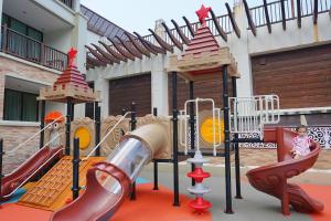 a childrens playground with a slide and a slide at Kacha Resort & Spa, Koh Chang in Ko Chang +148 photos