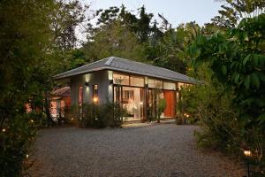 a small house in the middle of a forest at Boutique Jungle Villa - Baan ChaOm in Ko Lanta +37 photos