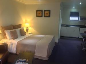 Postel nebo postele na pokoji v ubytování Central Park Motor Inn