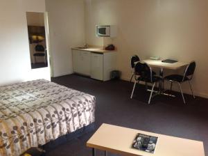 Postel nebo postele na pokoji v ubytování Central Park Motor Inn