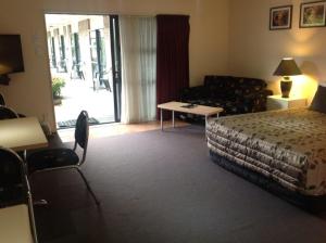 Postel nebo postele na pokoji v ubytování Central Park Motor Inn