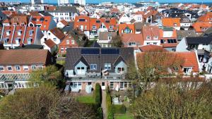 an aerial view of a city with houses at Salt and Sea in Norderney
