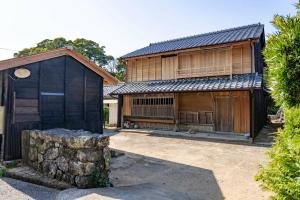 an old house with a barn and a building at 青木邸 in Tokushima +19 photos