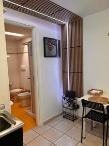 a bathroom with a sink and a toilet at B&B Crisalide in Putignano