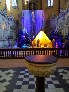 a church with christmas trees and a large tent at Appartement T2 face au golf in Buzet-sur-Tarn