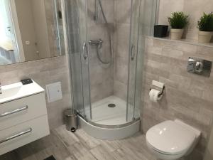 Kúpeľňa v ubytovaní Apartament Warszawska