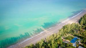 an overhead view of a beach and the ocean at OUTRIGGER Khao Lak Beach Resort in Khao Lak
