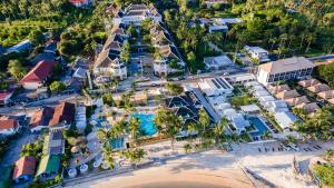 an aerial view of a resort with a pool at OUTRIGGER Koh Samui Beach Resort in Lamai