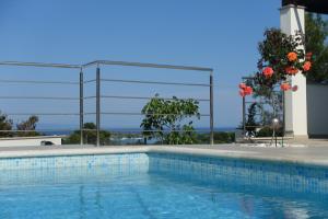 a swimming pool with a view of the ocean at Villa Mare in Ližnjan +43 photos