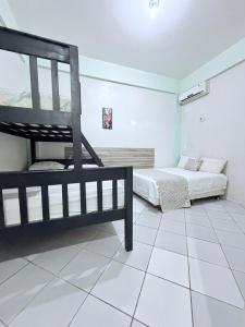 a bedroom with two beds in a room at Hotel Pousada-LG in Breves +19 photos