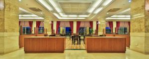 a restaurant with tables and chairs in a building at Hedef Resort Hotel in Konaklı +102 photos