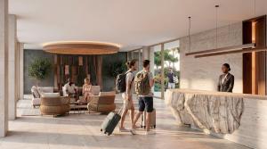 a group of people walking through a lobby with luggage at ROBINSON BOA VISTA - All inclusive in Sal Rei