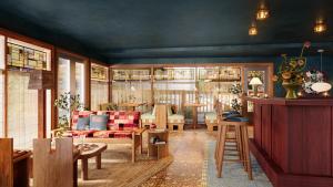 a living room with a couch and a table at Oyster Estate in Greenport