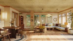 a living room with a couch and a table at Oyster Estate in Greenport