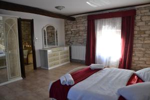 Een bed of bedden in een kamer bij Vila Vesna