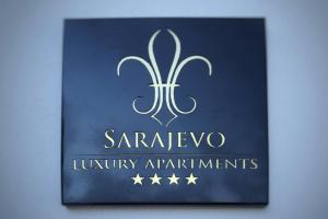 a sign for the new sarsley luxury apartments at Sarajevo Luxury Apartments in Sarajevo