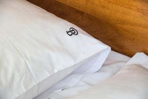 Postel nebo postele na pokoji v ubytování Hotel St. Barbara